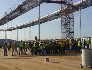 Workers constructing Istanbuls third bridge walk off job over bonus crisis