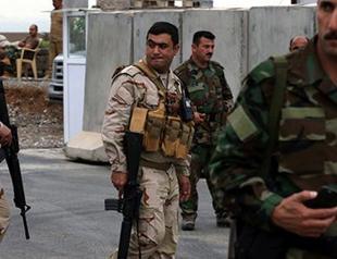 Kurd-Shiite clashes in northern Iraq kill ten, key road cut