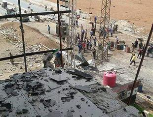 Car bomb kills seven near Syria Shiite shrine, says state TV