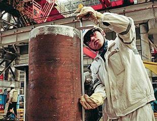 China manufacturing index expands at slower pace