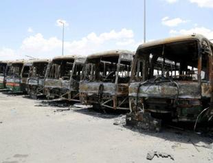 Saudi Binladin Group employees set fire to buses in protest after huge layoffs