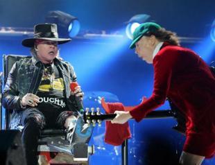 Rock of ages: Axl Rose makes AC/DC debut with open-air Lisbon gig