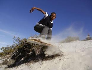 Poor South African boys find an escape in sandboarding