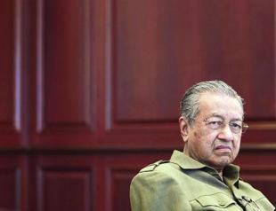 Former PM Mahathir quits Malaysia’s ruling UMNO party, protesting corruption
