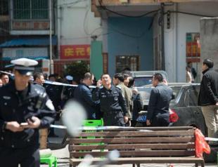 Ten children stabbed outside school gate in southern China
