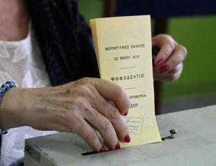 Greek Cyprus ruling conservatives hold slim lead in parliamentary vote exit poll