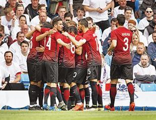 First-ever goal against England inspires Turkey despite 2-1 loss