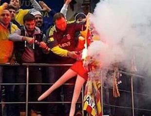 Turkish football fan humiliated women by burning sex doll, court rules