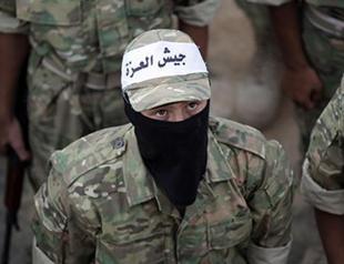 Clashes between ISIL, Syria rebels kill dozens near Turkey: Monitor