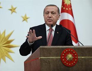 Turkey’s Erdoğan signs bill lifting lawmakers’ immunity