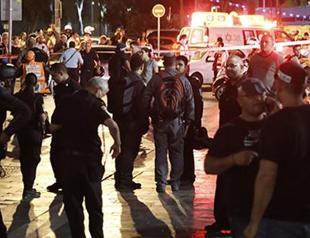 Israel suspends permits after deadly attack