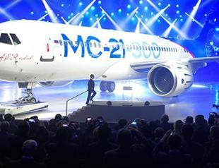 Russia unveils new passenger plane it says will rival Boeing, Airbus