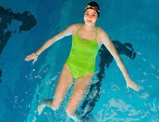 Syrian woman who pushed sinking dinghy from Turkey to Lesbos to compete in Rio