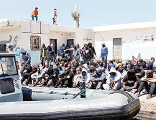 3,000 migrants rescued, 2 bodies found off Italian coast