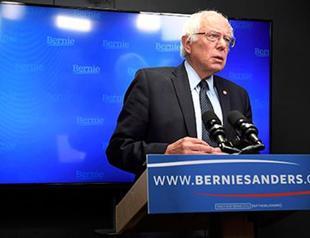 Sanders vows to help Clinton beat Trump, keeps rallying