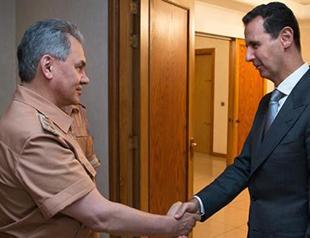 Russian minister visits Assad, base in Syria