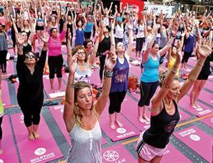 Millions stretch and bend for International Yoga Day