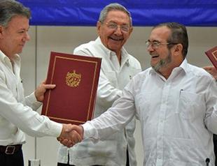 Tears of joy as rebels sign ceasefire with Colombian government