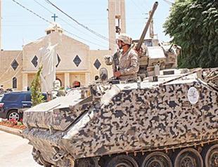 Lebanon raids Syrian camps after blasts