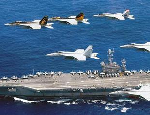 China to hold drills in disputed waters ahead of court ruling