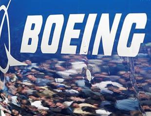 Boeing sees 20-year demand beating targets as company inks China deal
