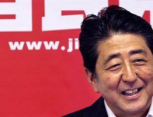 Abe claims win in Japan parliamentary poll