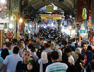 Tehran bazaar blends hope, caution a year after nuclear deal