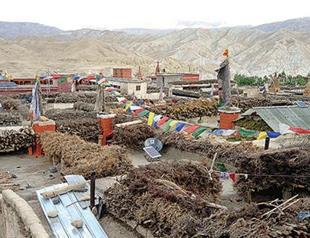 Road brings jeans, satellite TV to Himalayan Shangri-La