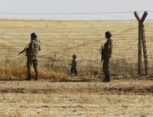 Turkey denies using force against Syrian refugees