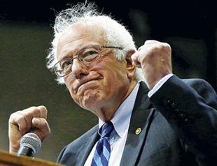 Trump rolls unrivaled, Sanders takes West Virginia