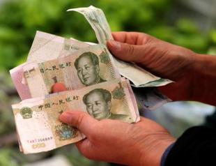 China bank lending slumps in April amid debt concerns