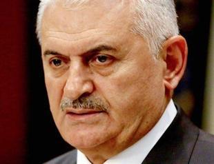 Turkish PM says rebels randomly shoot with choppers, jets