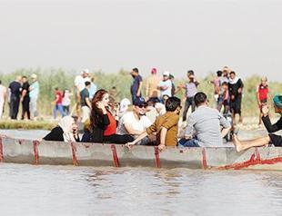 Iraqs marshes, once drained by Saddam, named world heritage site