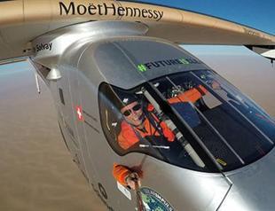 Solar plane circles globe in first for clean energy