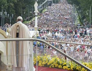 Pope Francis misses step, falls down before Mass in Poland