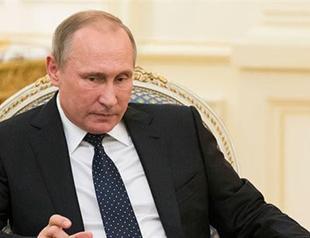 Russia’s Putin, Britain’s May agree to meet to try to thaw frosty ties