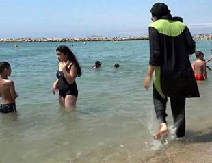 Police in Cannes stop Muslim women wearing banned burkinis