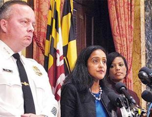 Federal report blasts Baltimore police over bias, force