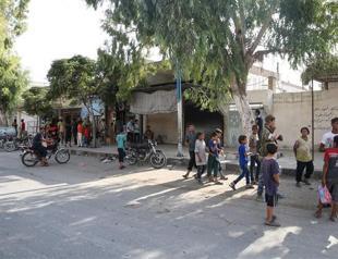 Free Syrian Army fighters clearing mines in Jarablus