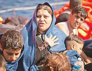 Six people, including two children, dead in migrant boat capsize off Libya