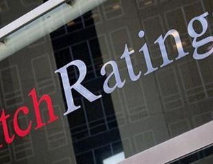 Fitch cuts Turkey debt outlook after coup attempt