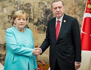 Merkel upbeat on air base, visa issues after Erdoğan meeting