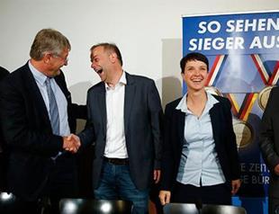 Germany’s anti-migrant populists beat Merkel’s party in local vote