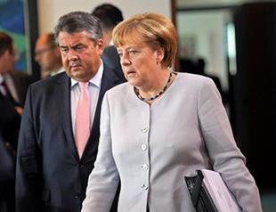 Merkel says faults made in refugee crisis