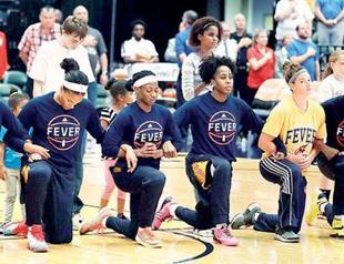 Entire Indiana Fever team kneels during anthem before playoff game
