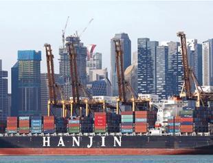 Asian giant’s chief apologizes for shipping chaos