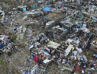 Haiti in pain as hurricane toll soars, aid sought
