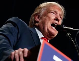 Trump vows to stay in race after lewd remarks surface