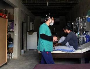 Local hospital operates inside carved-out hill in northern Syria