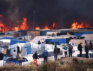 France clears out Calais migrant camp